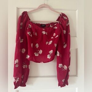Floral going out top. Perfect for a night out or paired with a blazer for work.